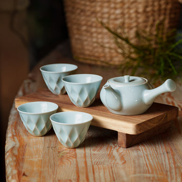 Light Blue Porcelain Tea Set with Textured Cups