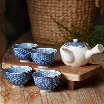 White Porcelain Tea Set with Blue Patterned Cups