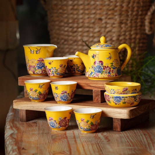 Yellow Porcelain Tea Set with Floral and Butterfly Design